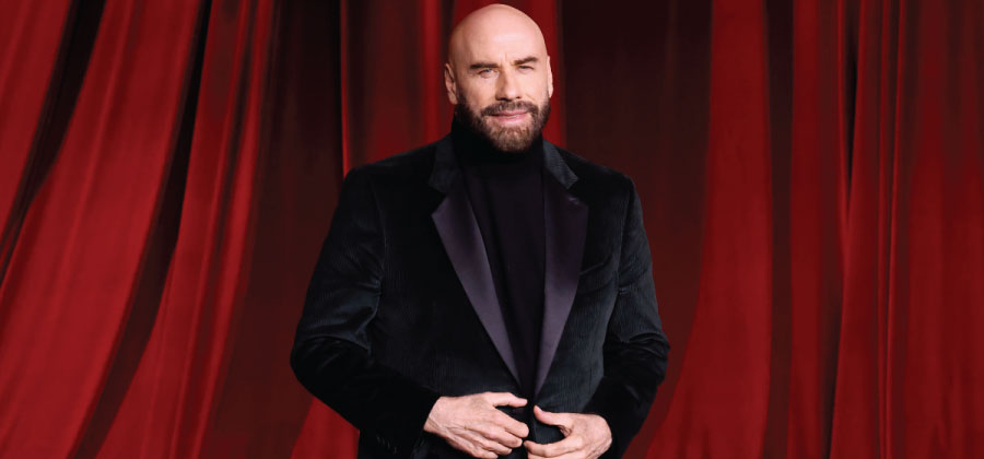 John Travolta speak languages fluently